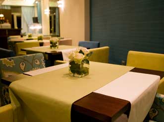 Table and chairs at the luxury boutique Onira